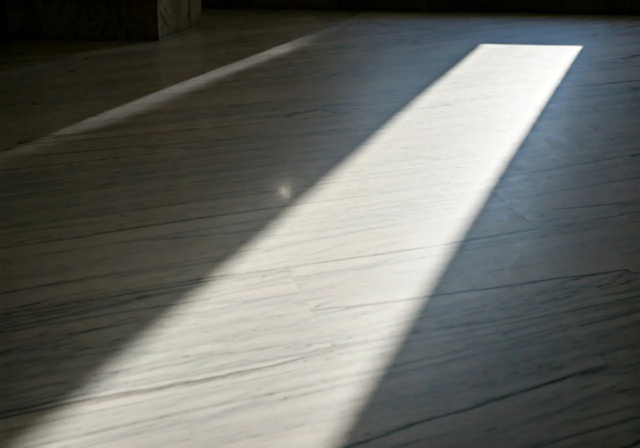 A luxurious Italian marble floor with natural light shining. 35mm stock photo