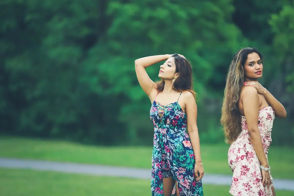 Woman Wearing Colorful Dresses on a Meadow