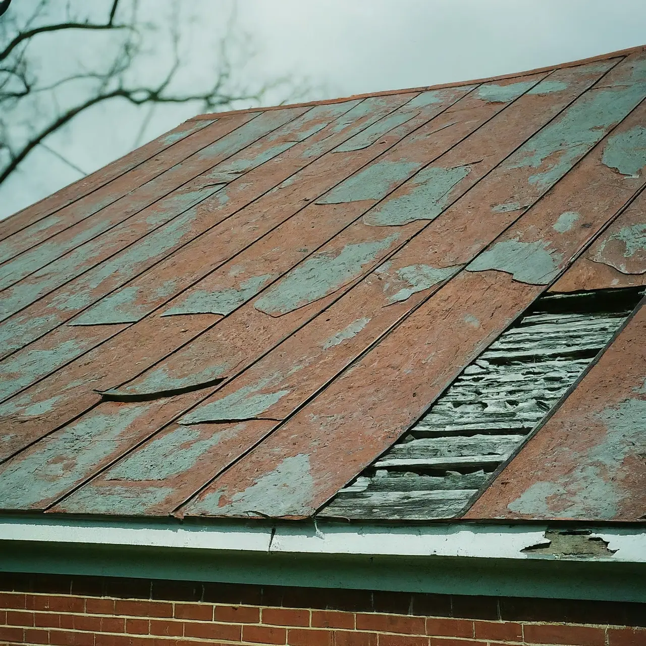 A worn-out roof on a residential house in Martinsburg, WV. 35mm stock photo