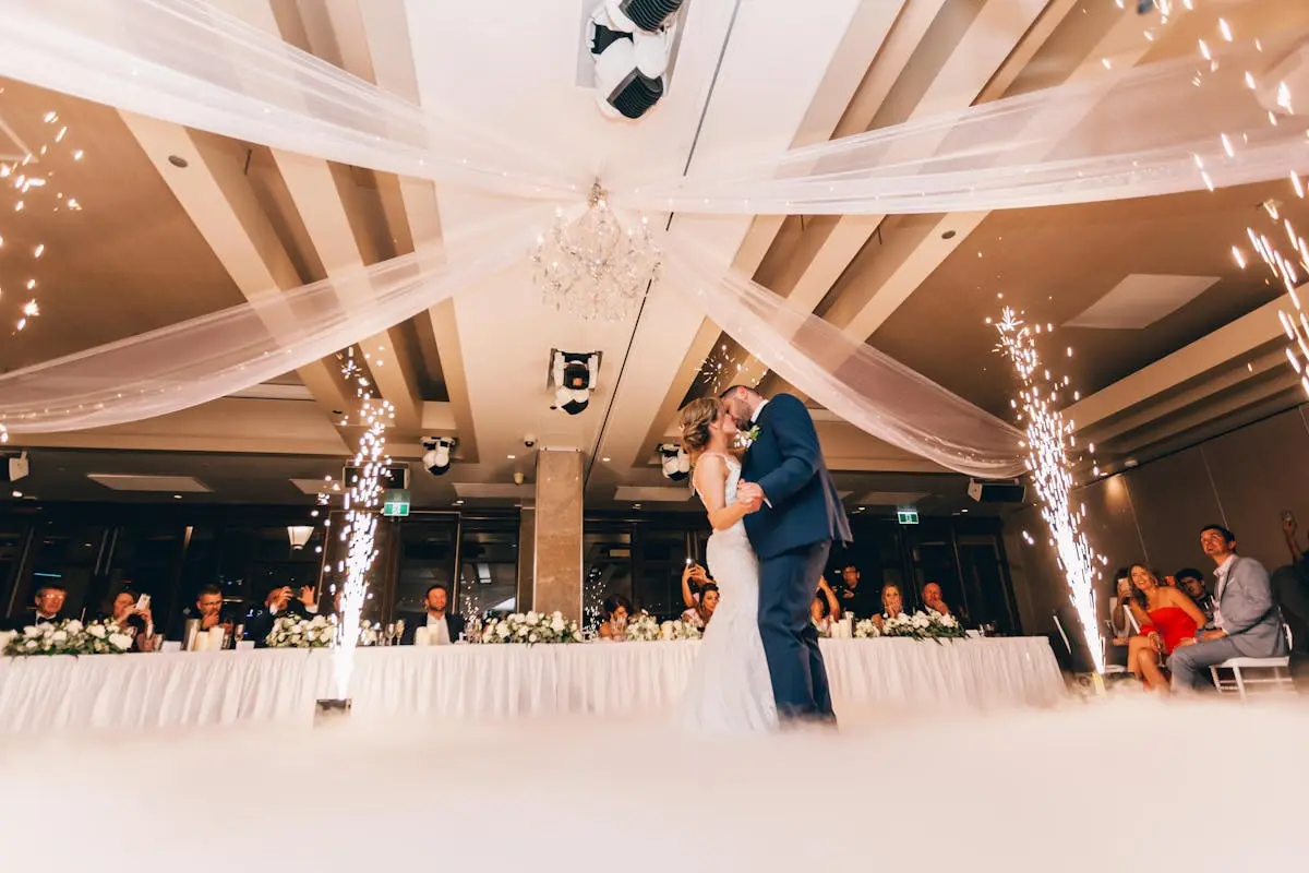 Low Angle Photography of Bride and Groom Dancing