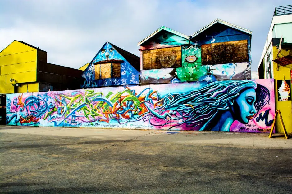 Colorful graffiti mural on a street wall in Los Angeles, showcasing urban art culture.