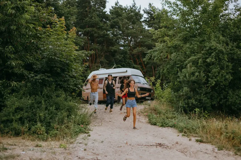 3 Women and 2 Men Standing on Dirt Road Near White Van