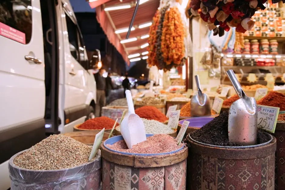 Vibrant display of spices in a bustling Istanbul market, highlighting Turkish culture and trade.