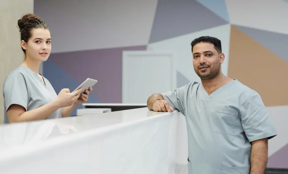 A Receptionist and a Practitioner at the Reception