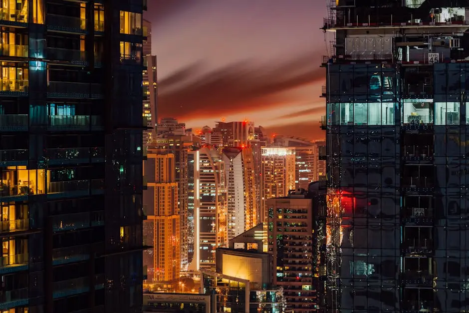 Stunning Dubai cityscape at night, showcasing vibrant lights and modern skyscrapers.