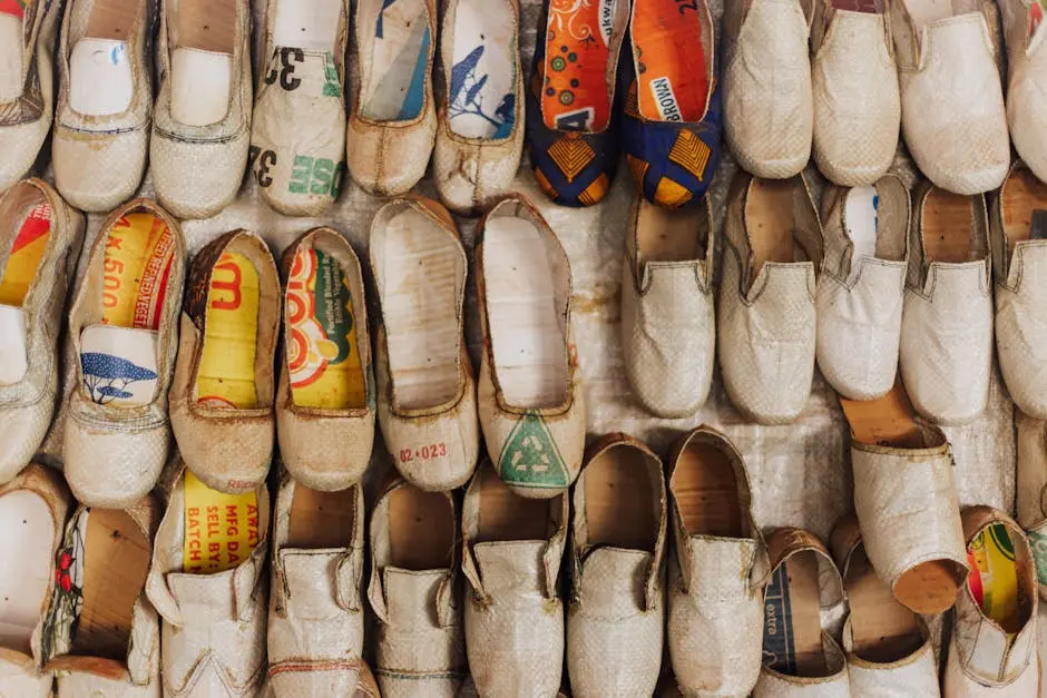 Handmade slip-on shoes crafted from recycled materials, showcasing sustainable fashion in Uganda.