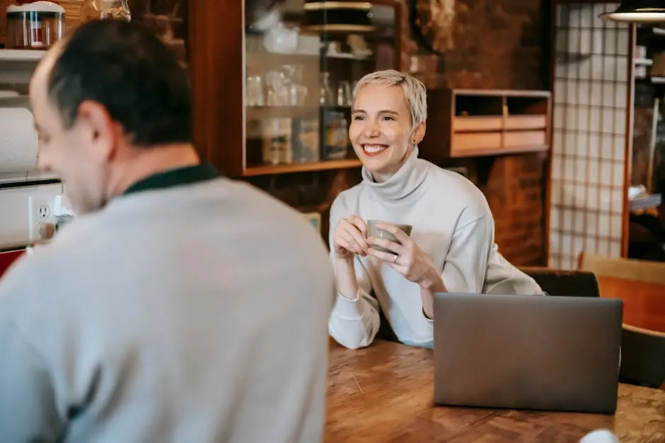 Content woman with coffee talking to boyfriend at home