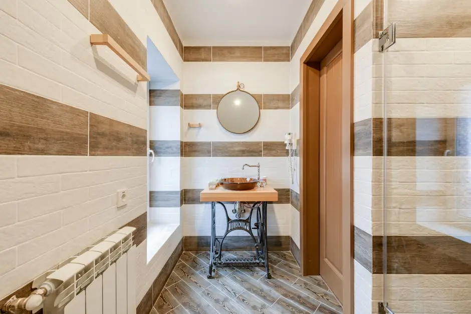 Stylish bathroom with upcycled sink table and round mirror.