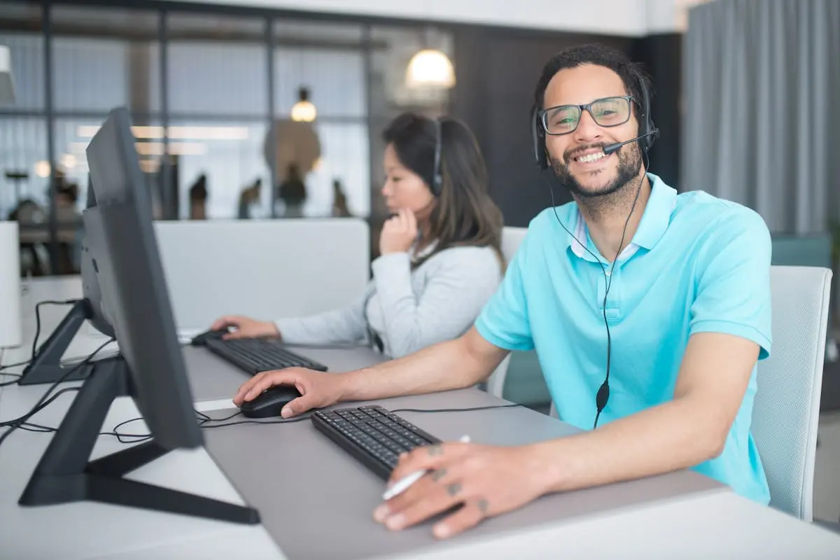 A Man and a Woman Working in a Call Center