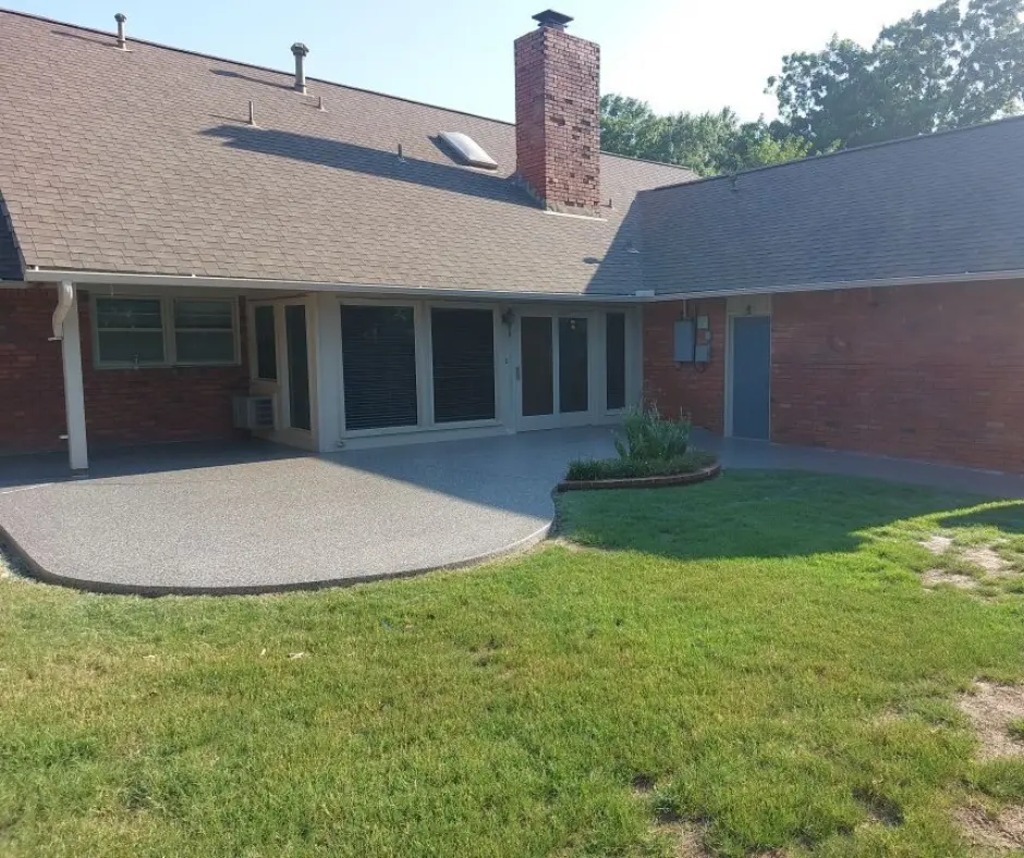 back patio with concrete coating of polyurea to keep the heat off of the pavement