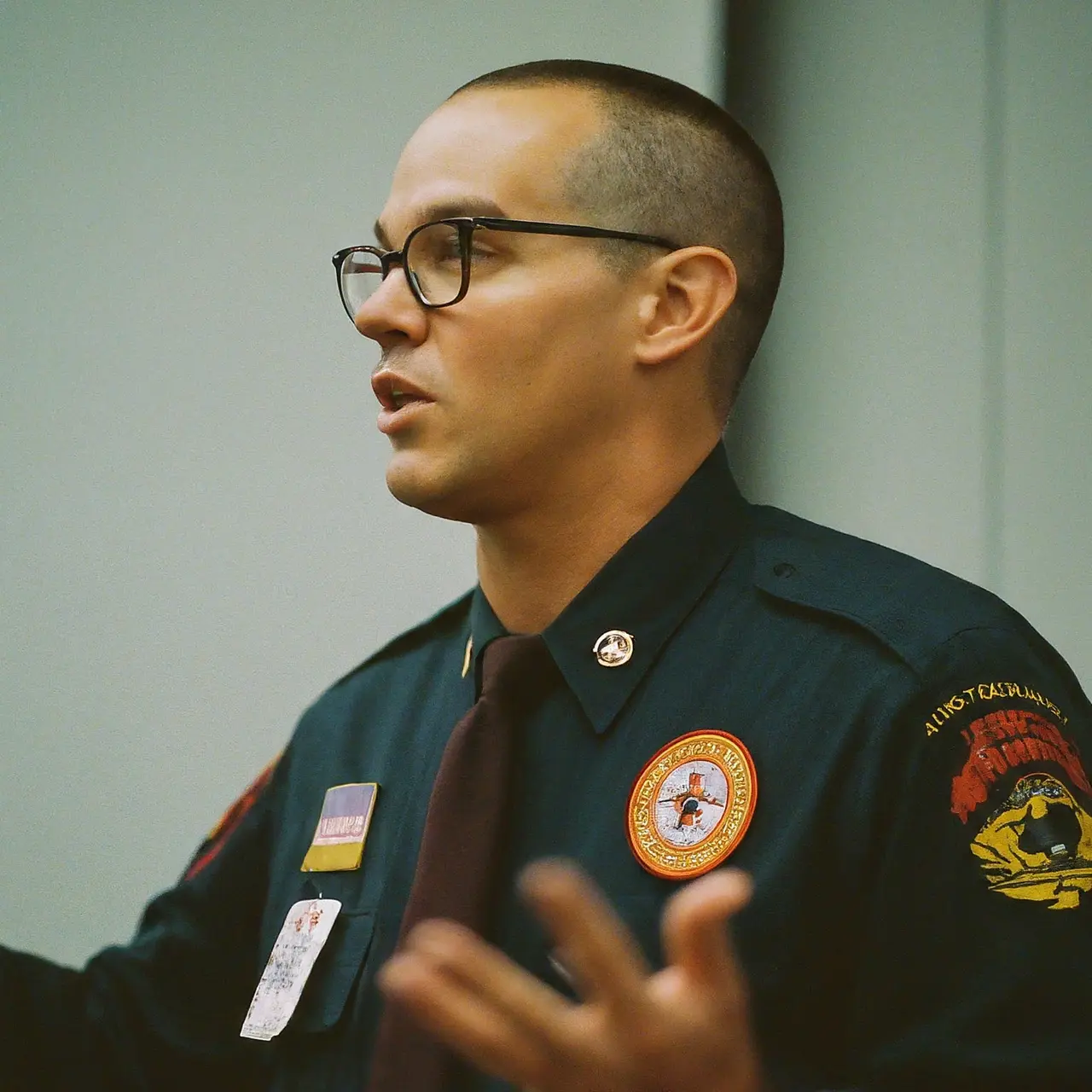 A FEMA instructor giving a lecture in a classroom setting. 35mm stock photo