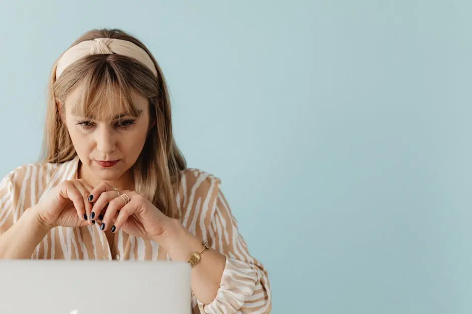 Portrait of a Woman in front of a Laptop