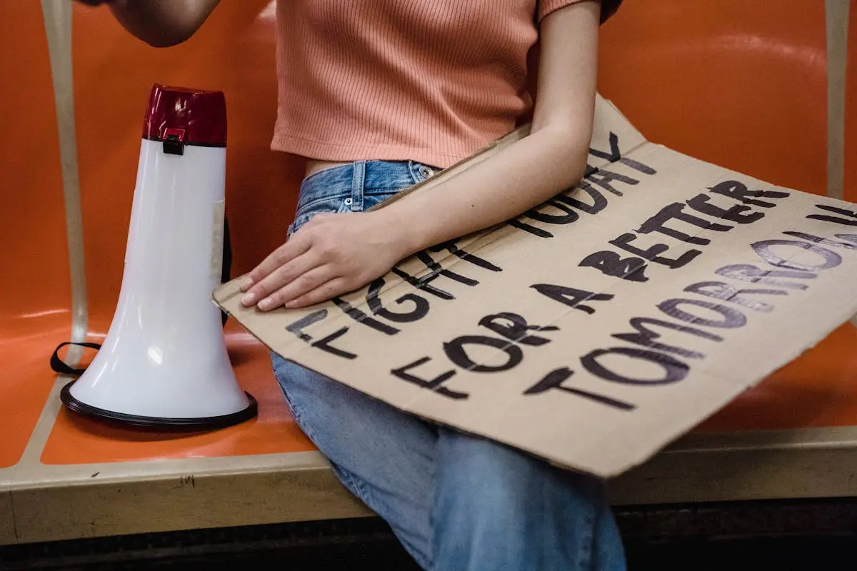 Slogan on a Person’s Lap 