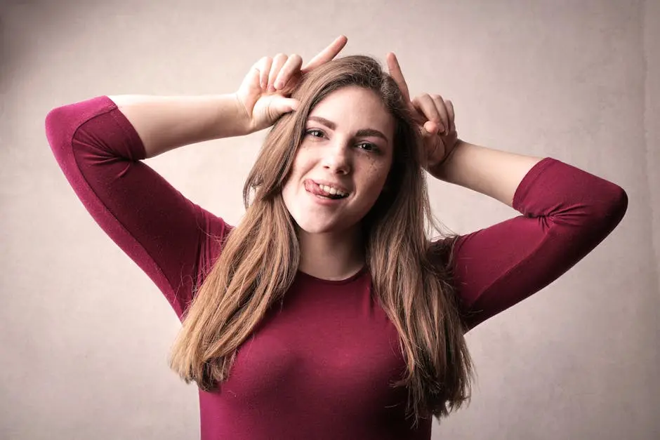 Woman in Red Long Sleeve Shirt Making a Funny Face