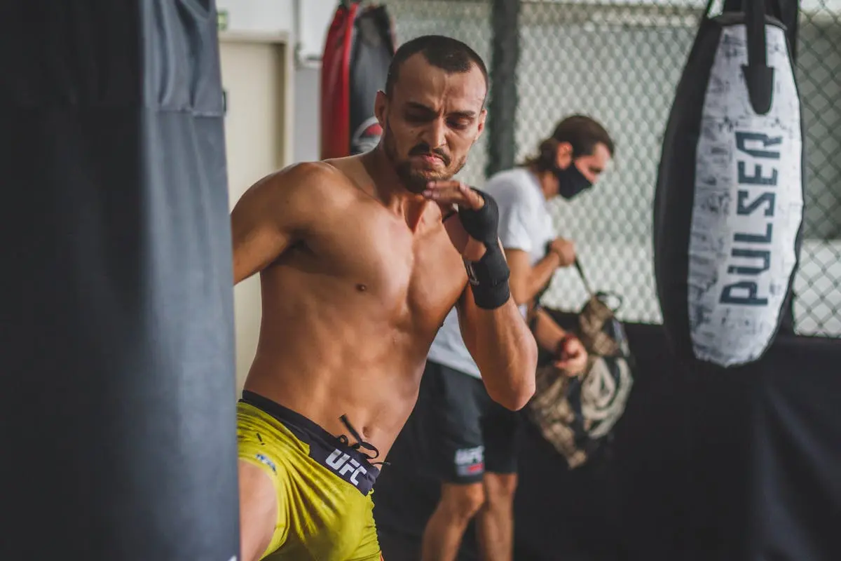 Topless Man in Yellow Shorts