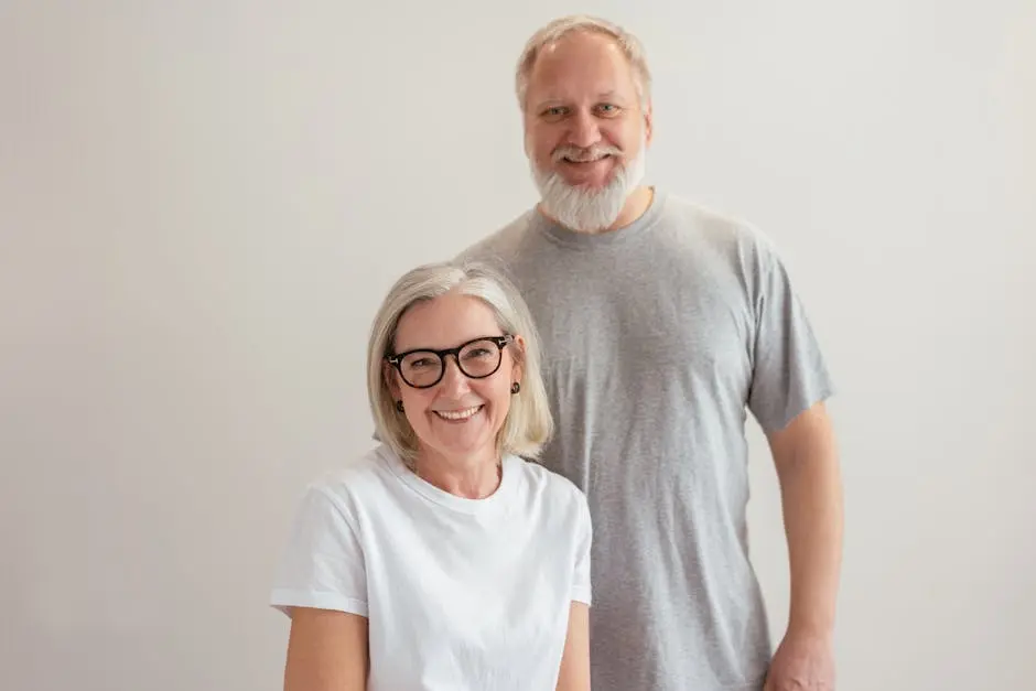 A Happy Elderly Couple Looking at Camera