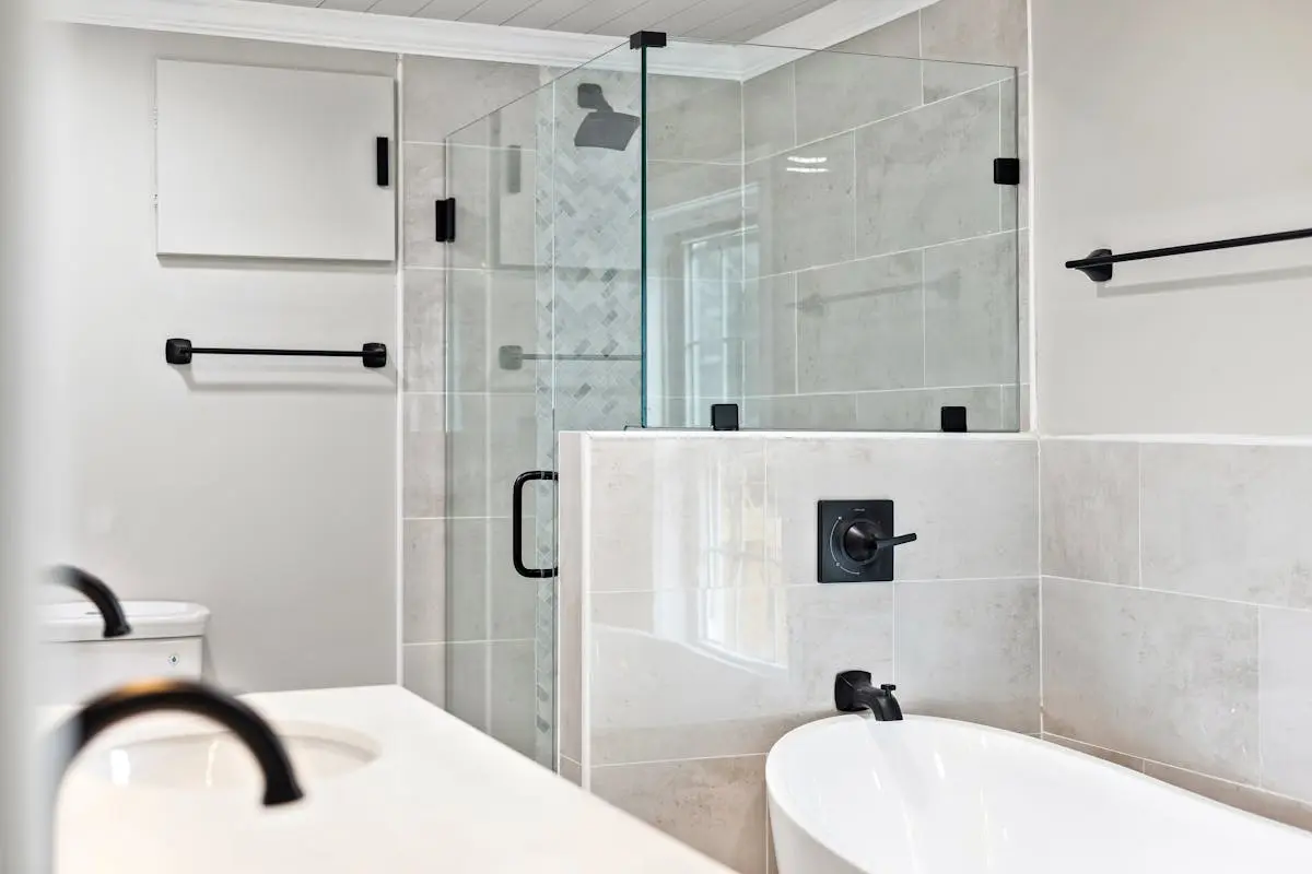 White Tiles inside the Bathroom