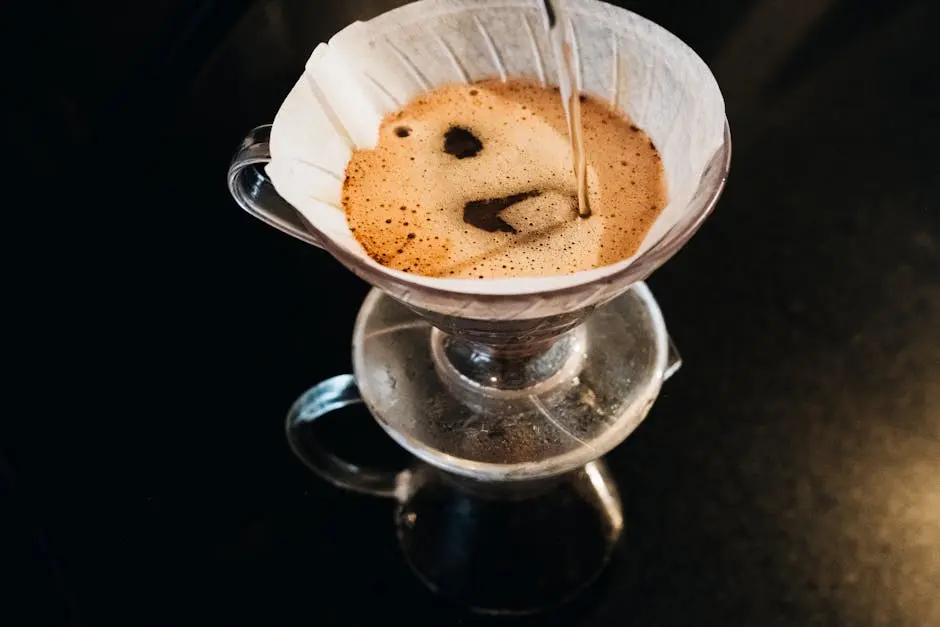 Top view of a pour-over coffee brewing process using a filter dripper set.