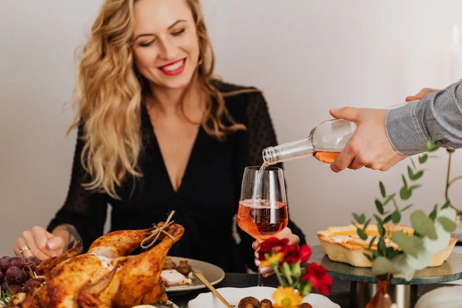 Man carefully pouring red wine into a woman's glass, showcasing proper wine handling techniques