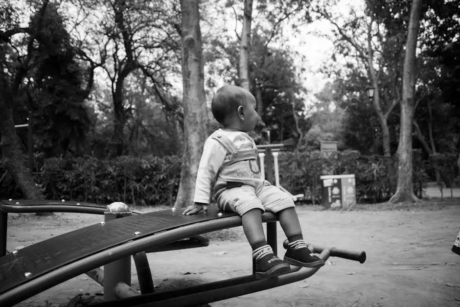 Baby Sitting on Fit Crossing Device in Park