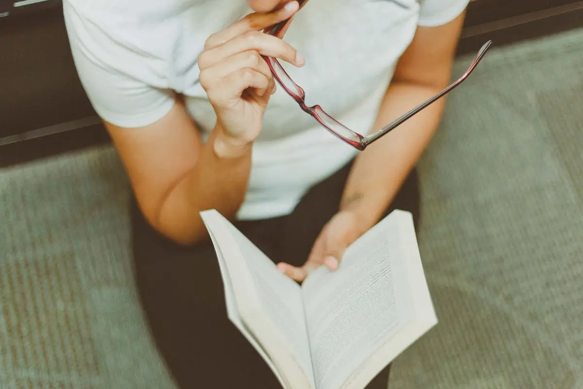 Photo Of Woman Holding Book