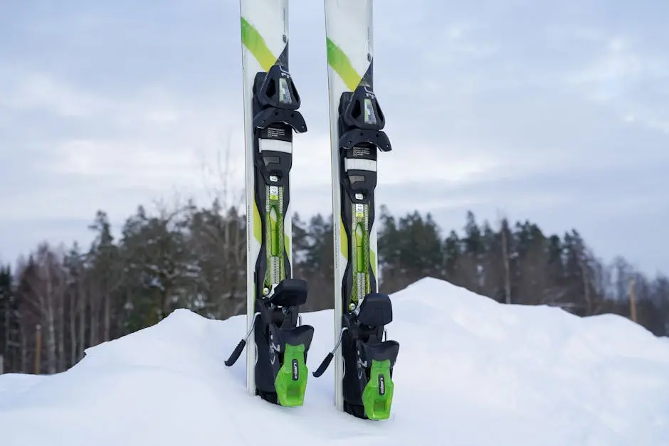 Close-up of skis in a snow-covered forest, perfect for skiing enthusiasts. Winter outdoor sports concept.