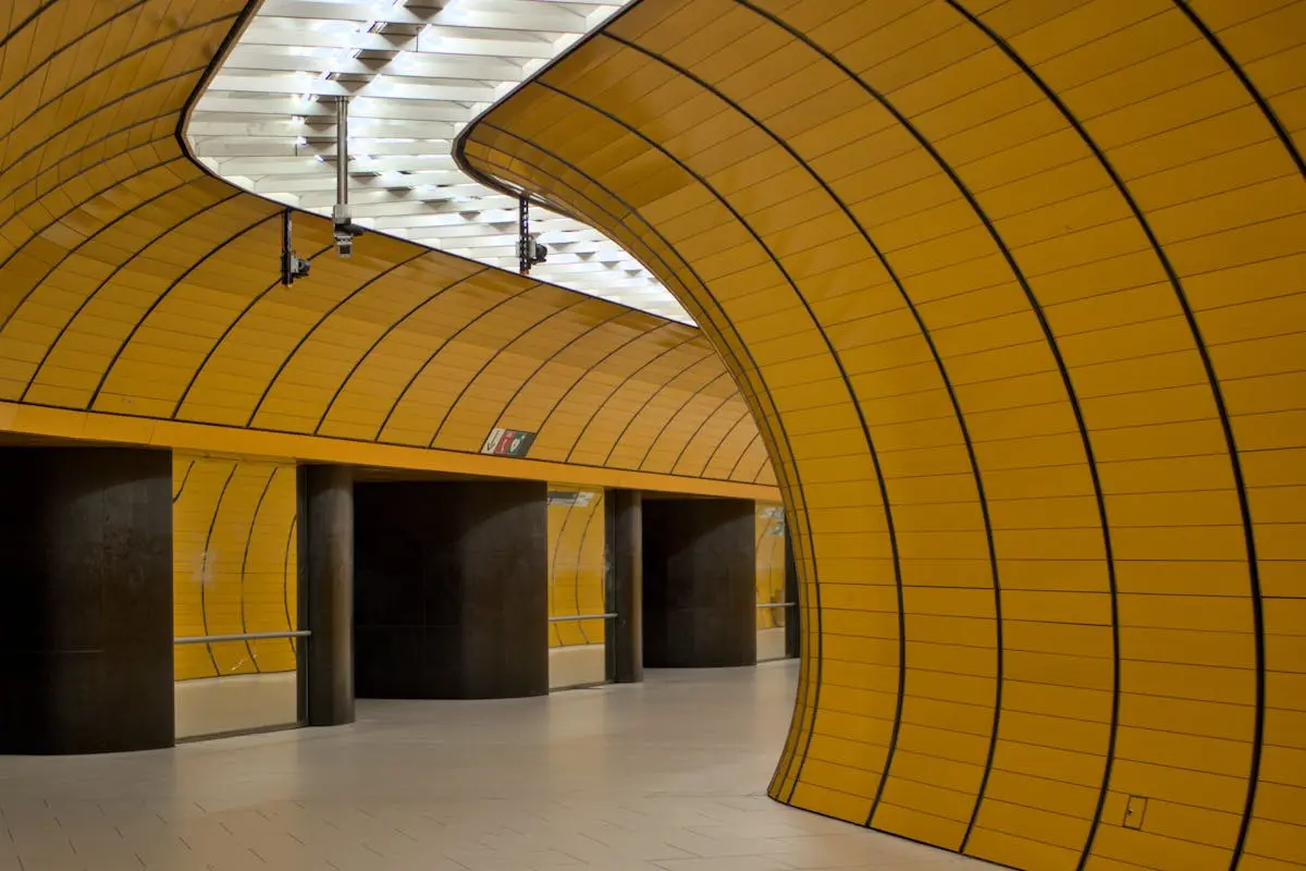 Explore the striking modern architecture of Munich’s sleek yellow subway station.