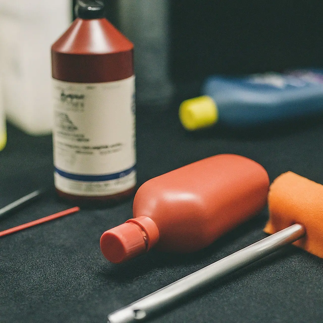 A close-up of car detailing tools and cleaning products. 35mm stock photo