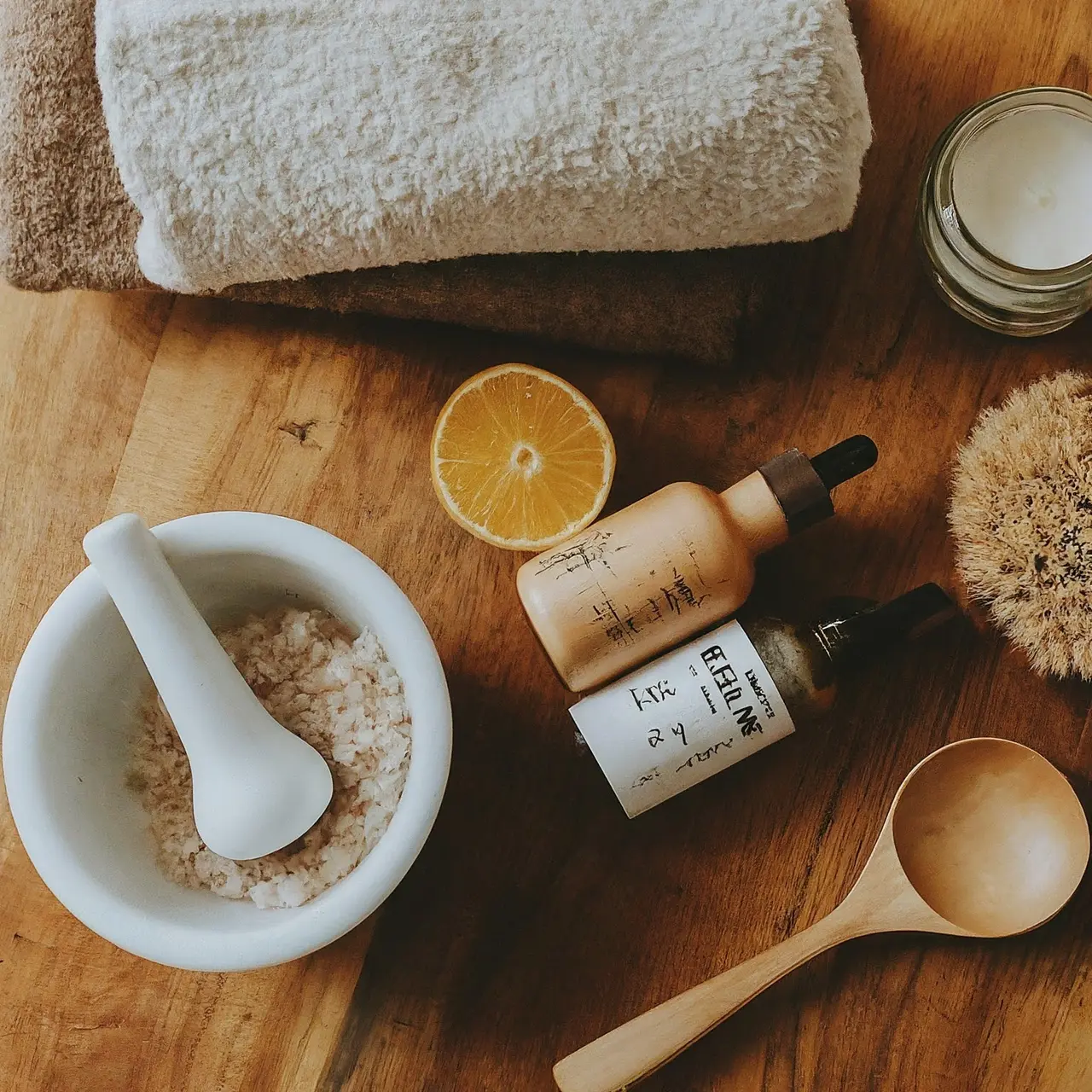 A selection of natural wellness products on a wooden table. 35mm stock photo