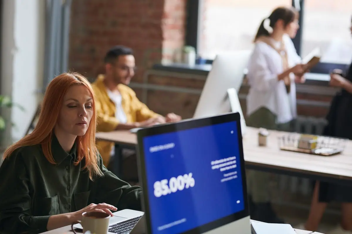 Woman Seated Working on Computer