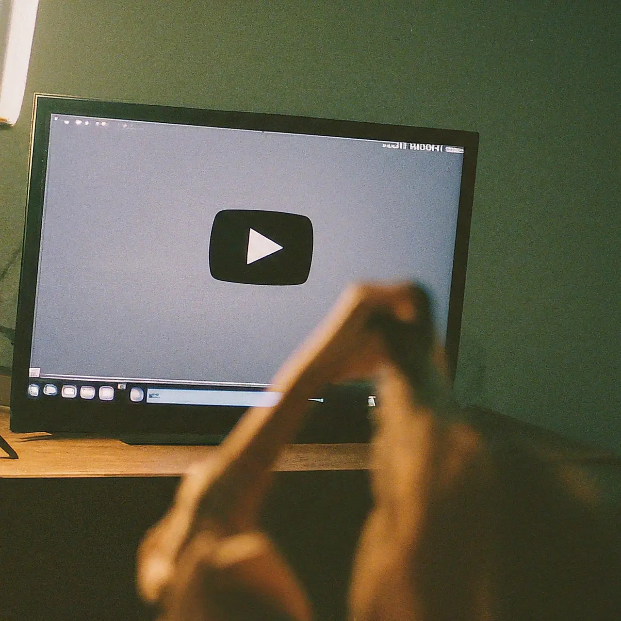 Clapperboard with views count and YouTube logo on a screen. 35mm stock photo