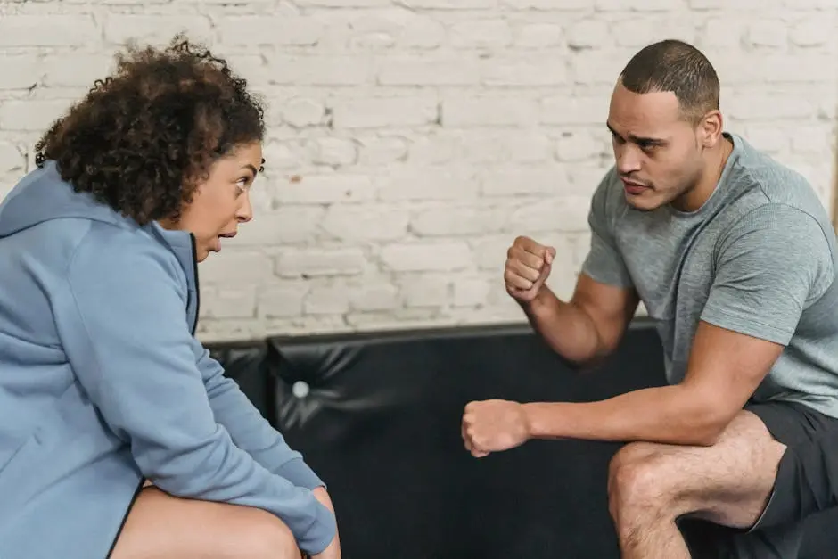 Black trainer teaching woman to do exercise