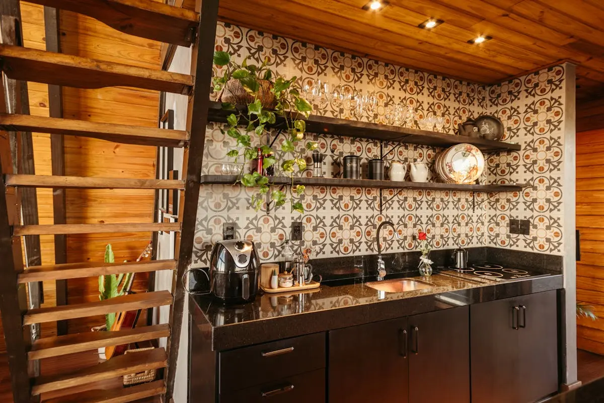 Kitchen with Ornate Tiles on Wall
