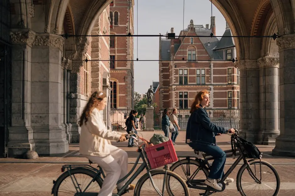 Women on Bicycles on the Streets of Amsterdam, the Netherlands