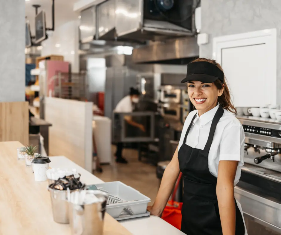 happy business owner with aces floors