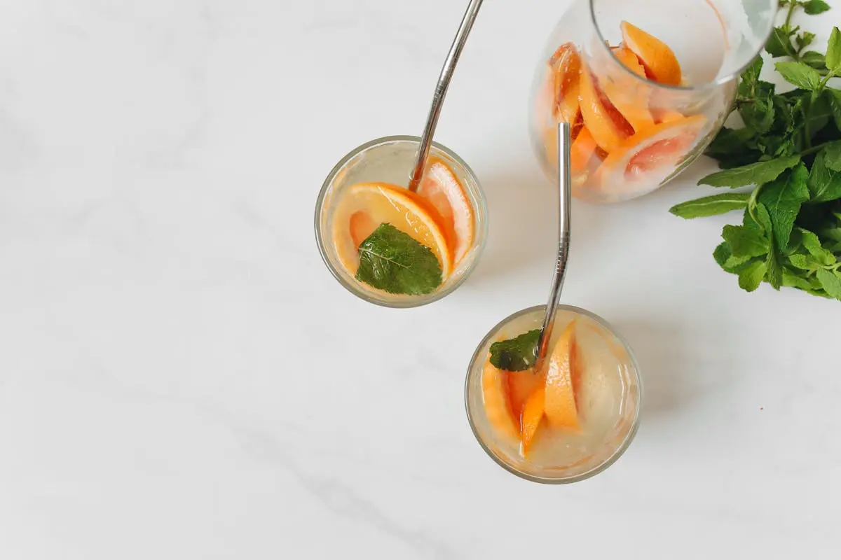 Top view of refreshing grapefruit and mint-infused water, perfect for a healthy and nutritious drink.