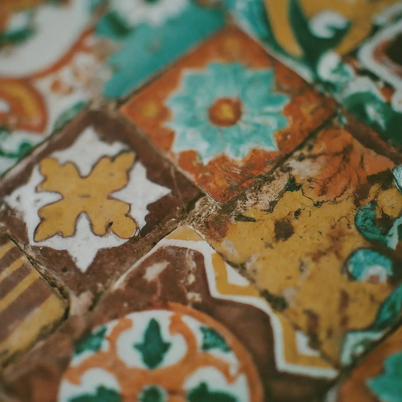 A close-up of colorful, patterned ceramic tiles. 35mm stock photo