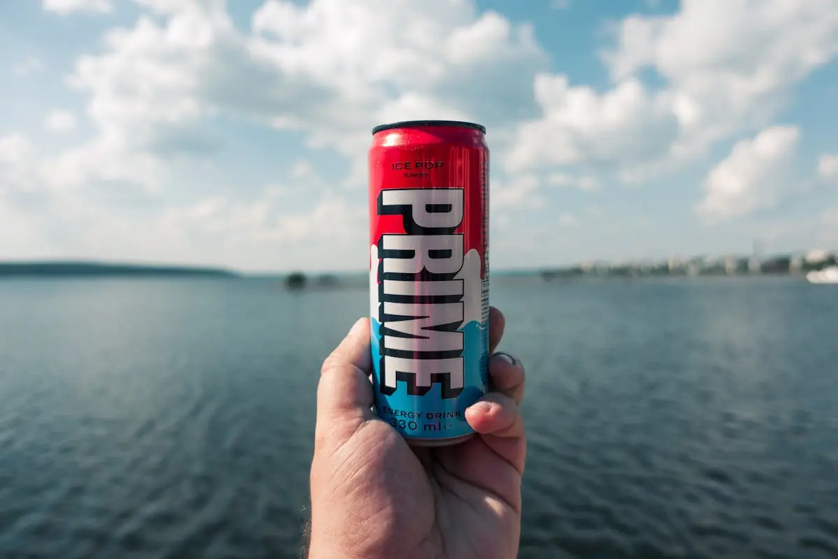 Can of Prime Energy Drink showing if you spill in your gym bag it can be cleaned up