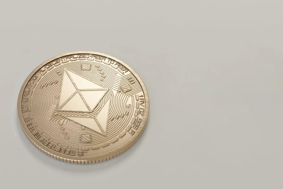 Round Gold-colored Ethereum Coin