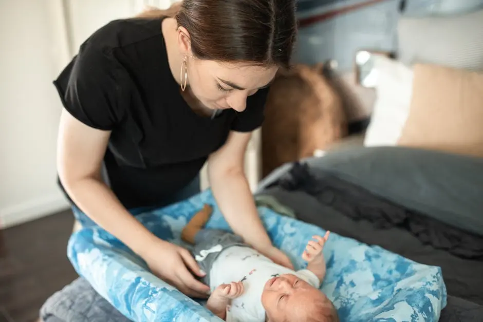 A Woman Taking Care of Her Baby