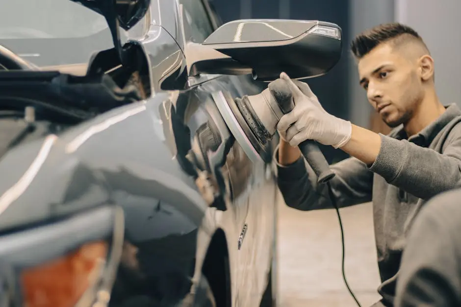 Man Polishing Car with Device