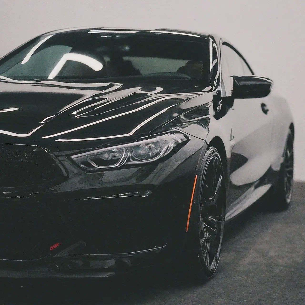 A shiny car with a flawless ceramic coating finish. 35mm stock photo