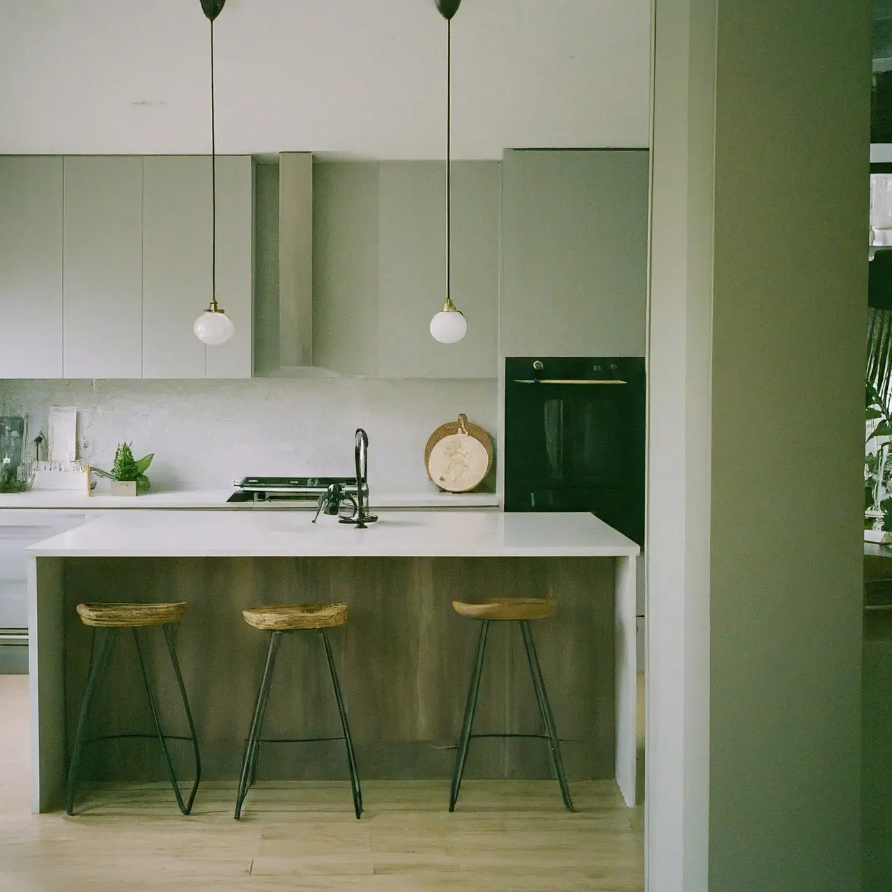 Modern kitchen with a large, central island. 35mm stock photo