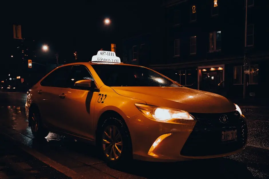 Photo of a Taxi at Night Time