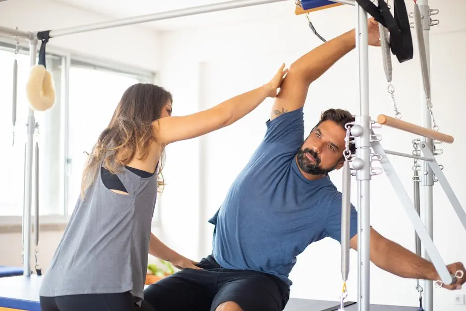 A Woman Guiding an Exercising Man