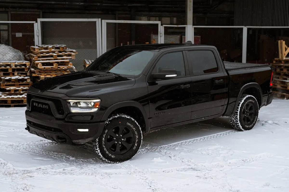 Black Pick-up Truck on Snow