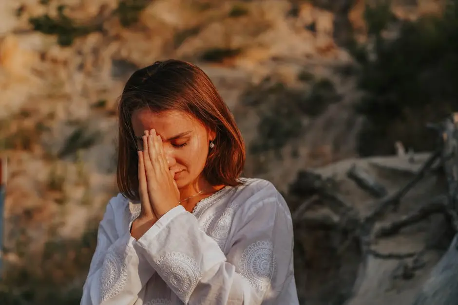 A woman meditates outdoors, eyes closed, demonstrating a peaceful pose and mental clarity.