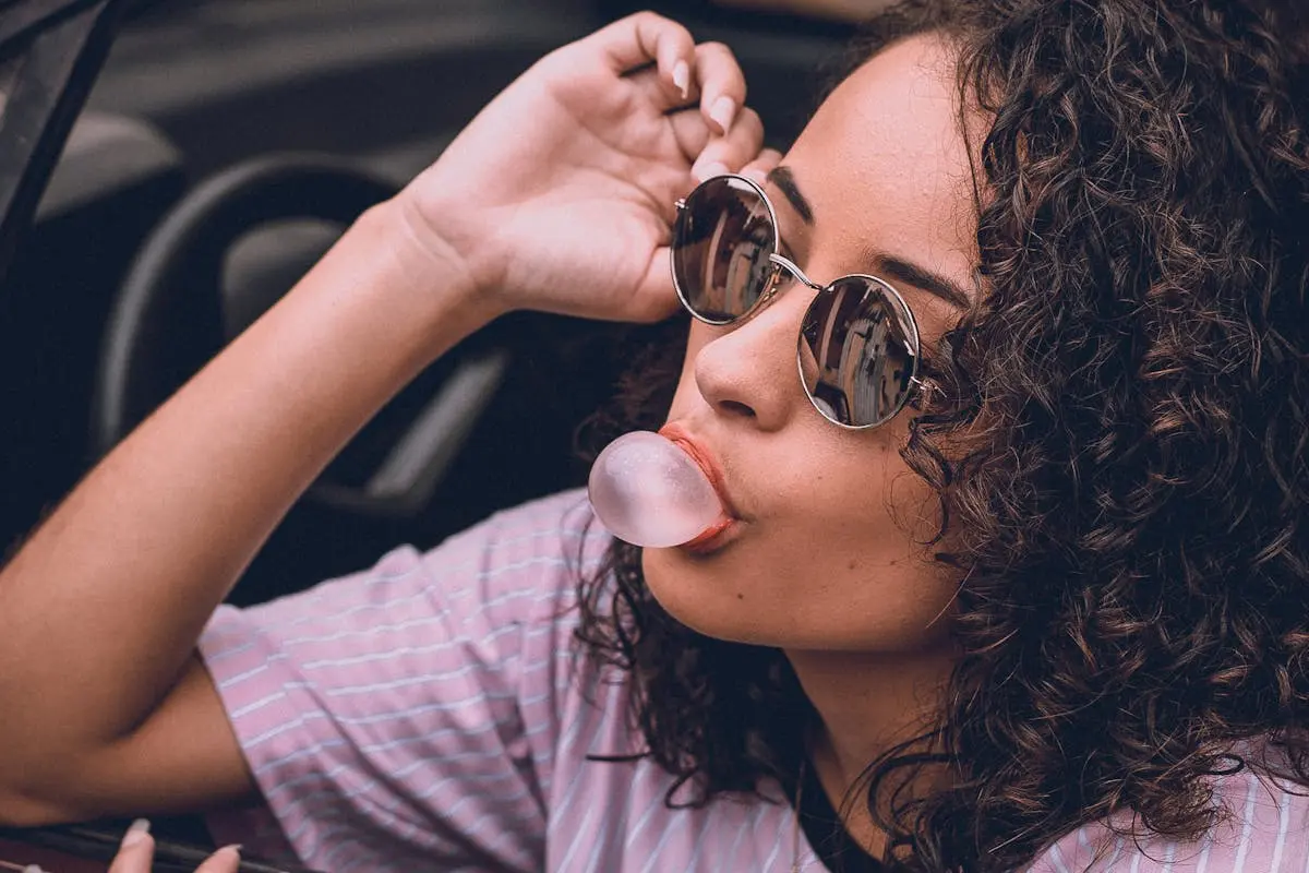 A Woman Wearing Black Sunglasses