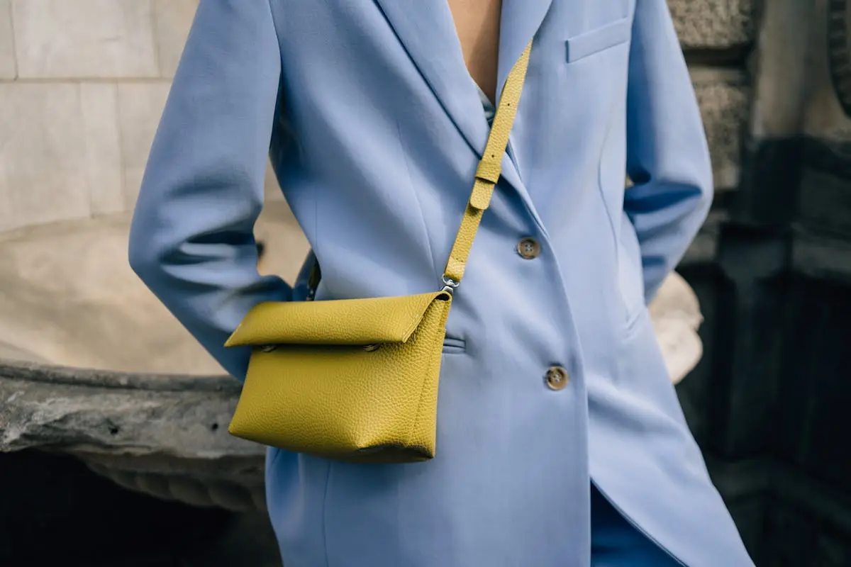 Person in Blue Blazer and Yellow Sling Bag