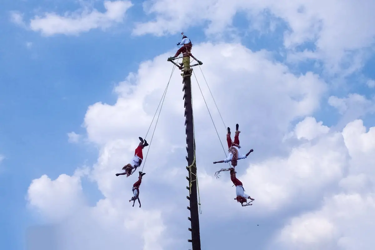 Performers Tied to a Pole